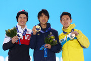 Denis_Ten_Medal_Ceremony_Winter_Olympics_Day_mxe